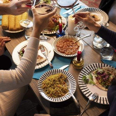 high-angle-people-holding-drinks-min
